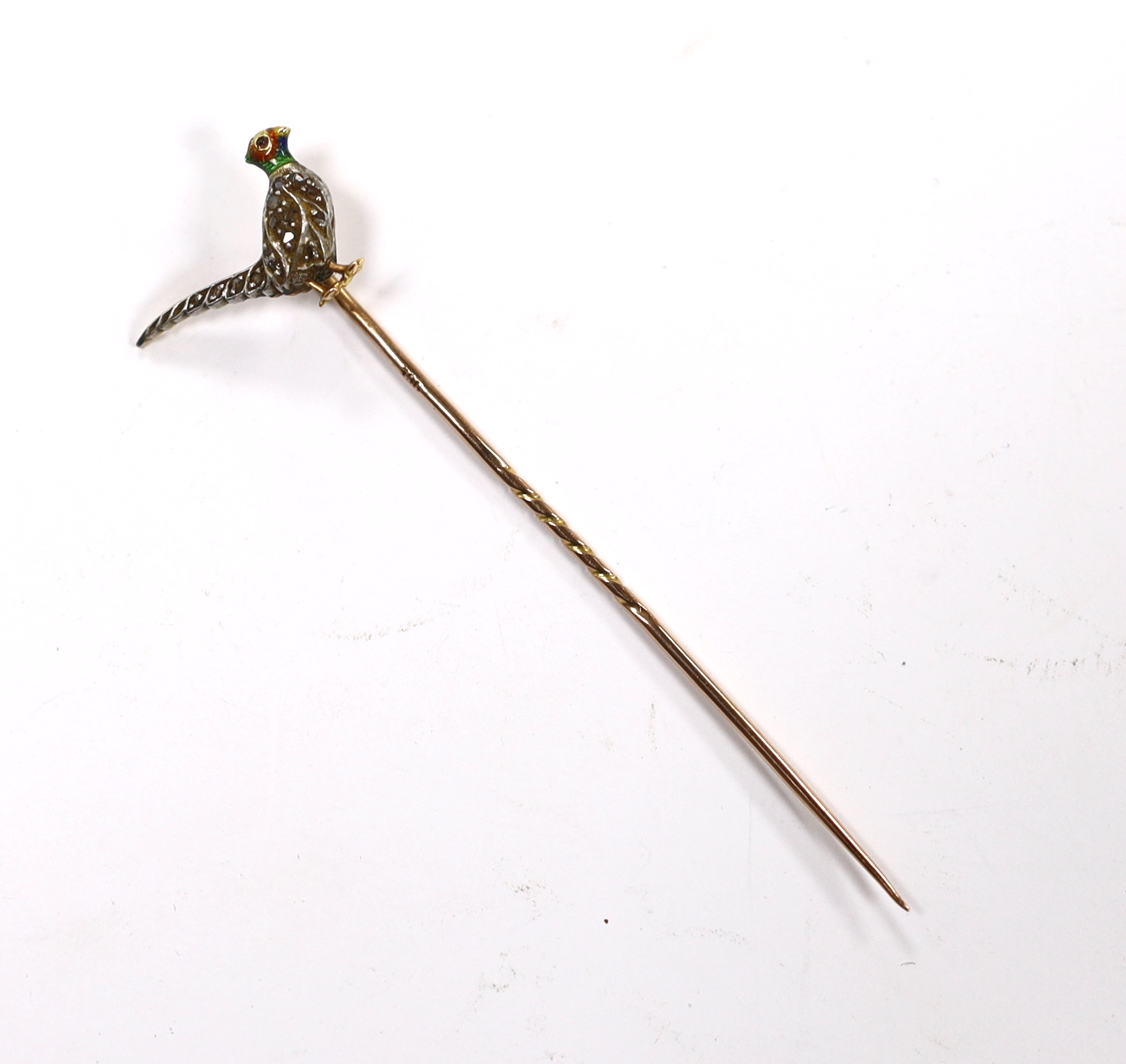 An Edwardian yellow metal, enamel and rose cut diamond set pheasant stick pin, 68mm, gross weight 2.1 grams.